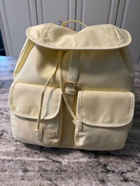 Year of Ours Soft Yellow Backpack with Front Flap Pockets